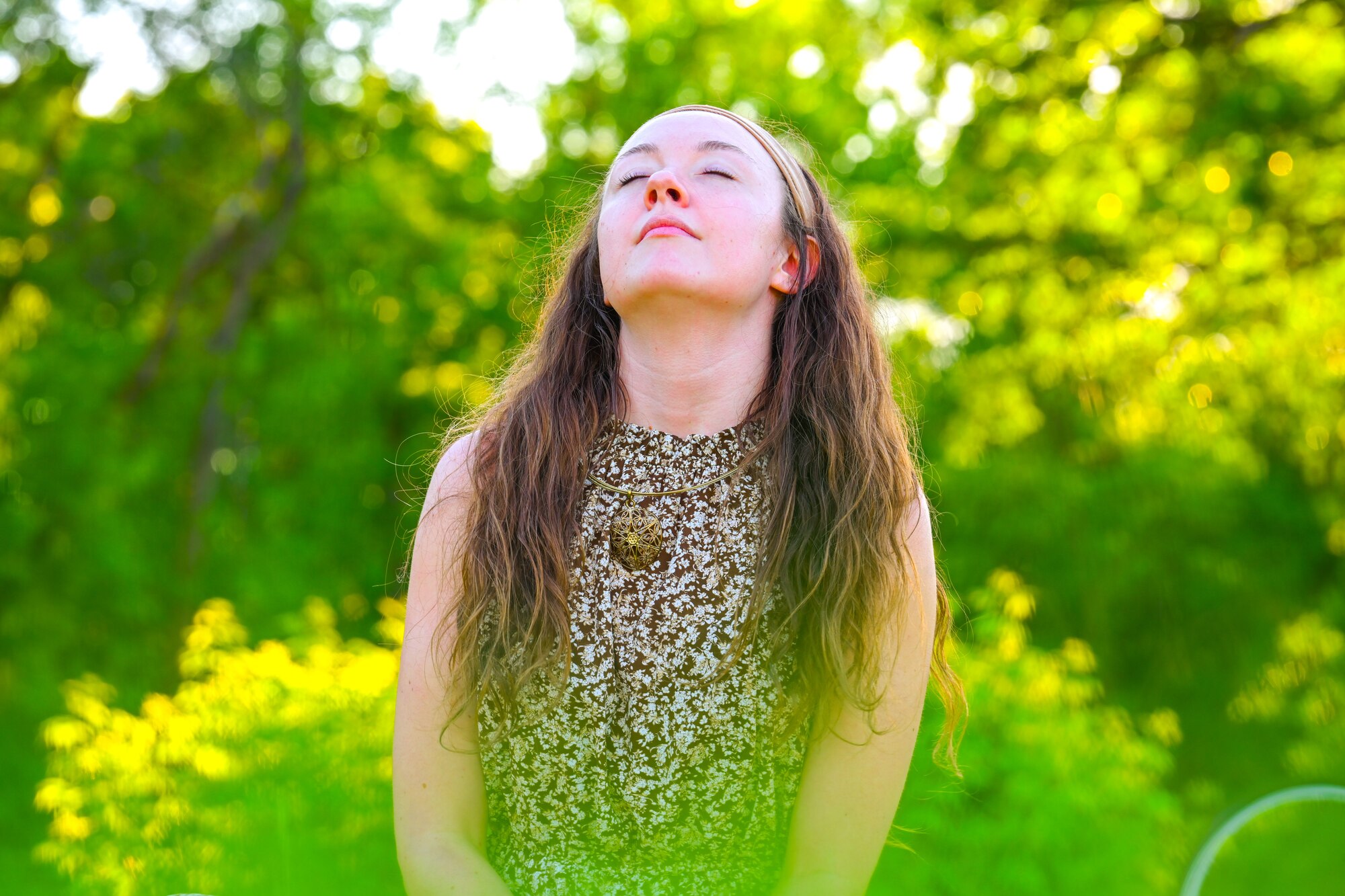 Emerald Klett, Golden Meditation owner, leads a meditation class at Roosevelt Park, Minot, North Dakota, June 24, 2024. Klett holds weekly meditation classes that are free and open to the public.