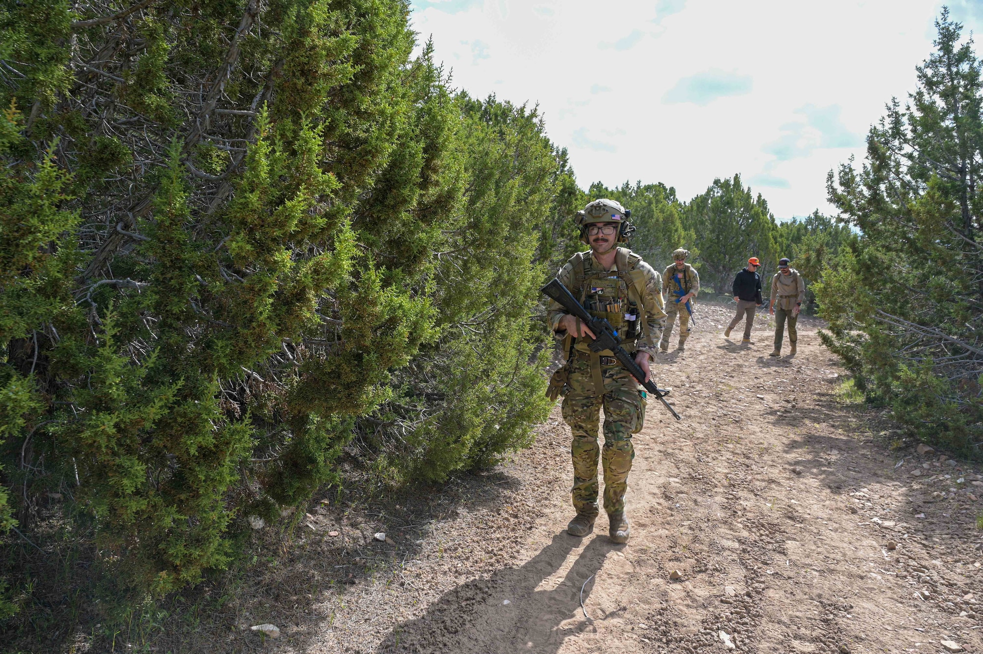 Airman rucking in the woods