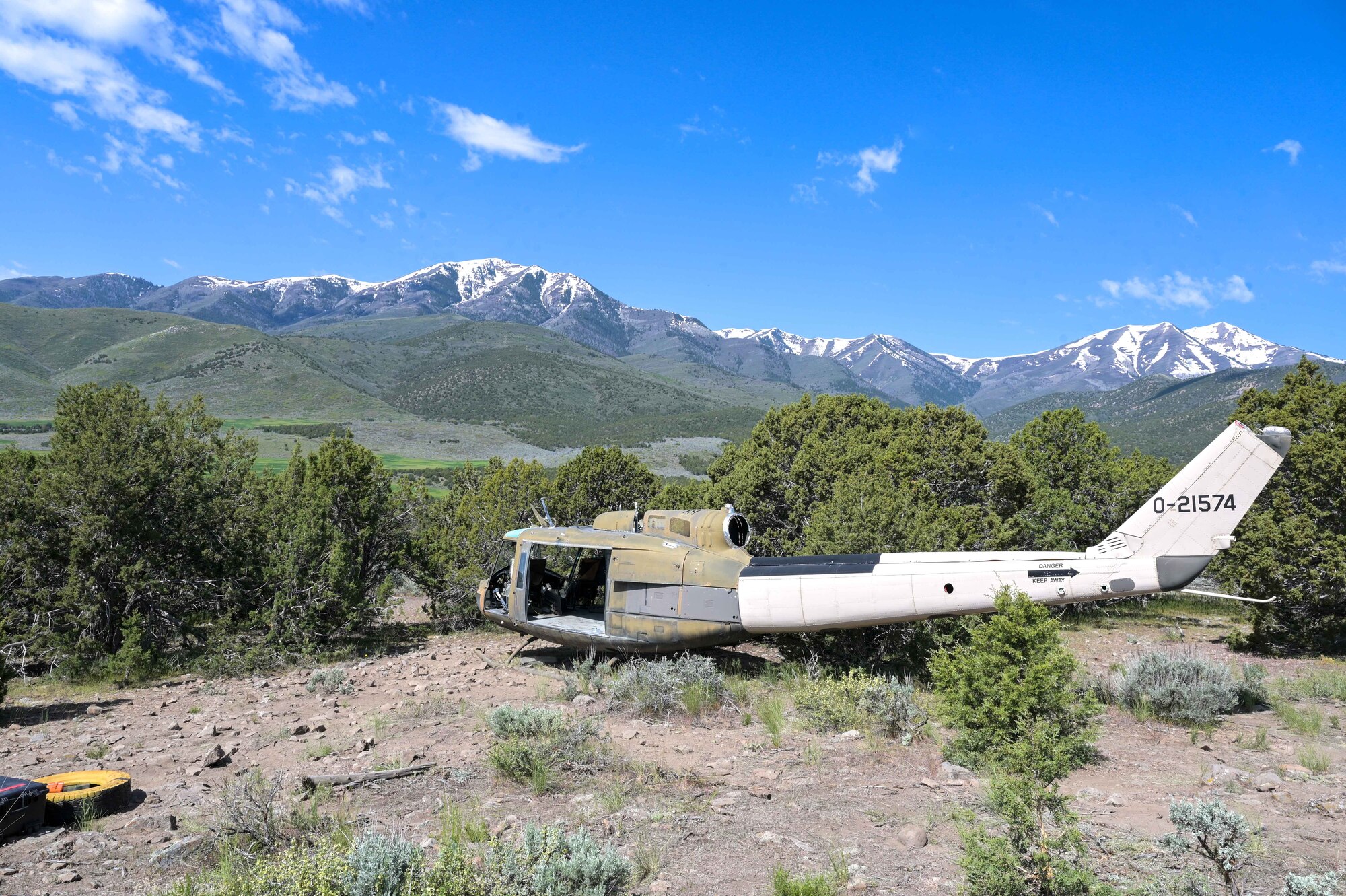 Aircraft sitting on a mountain.