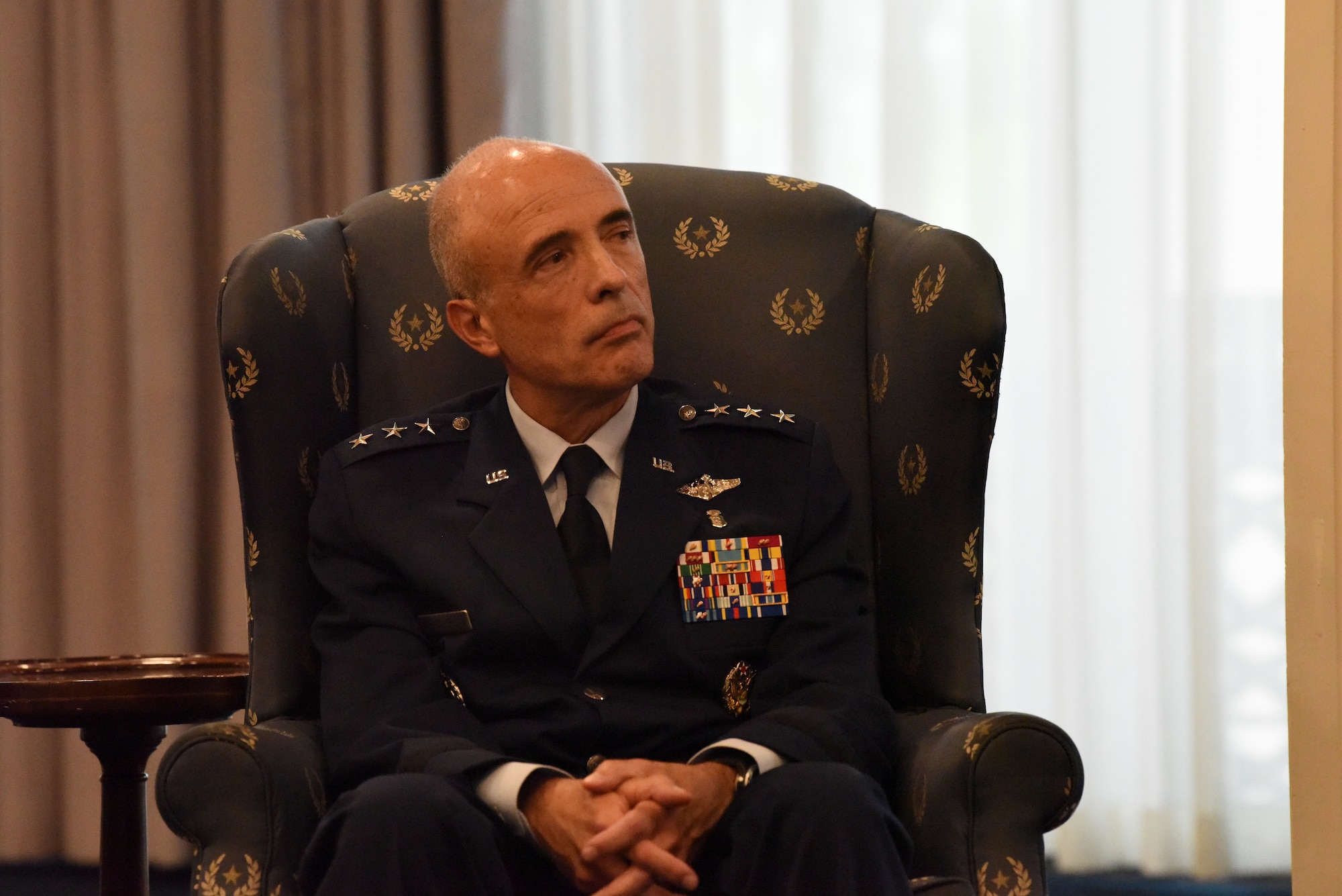 Image of an Airman sitting in chair.