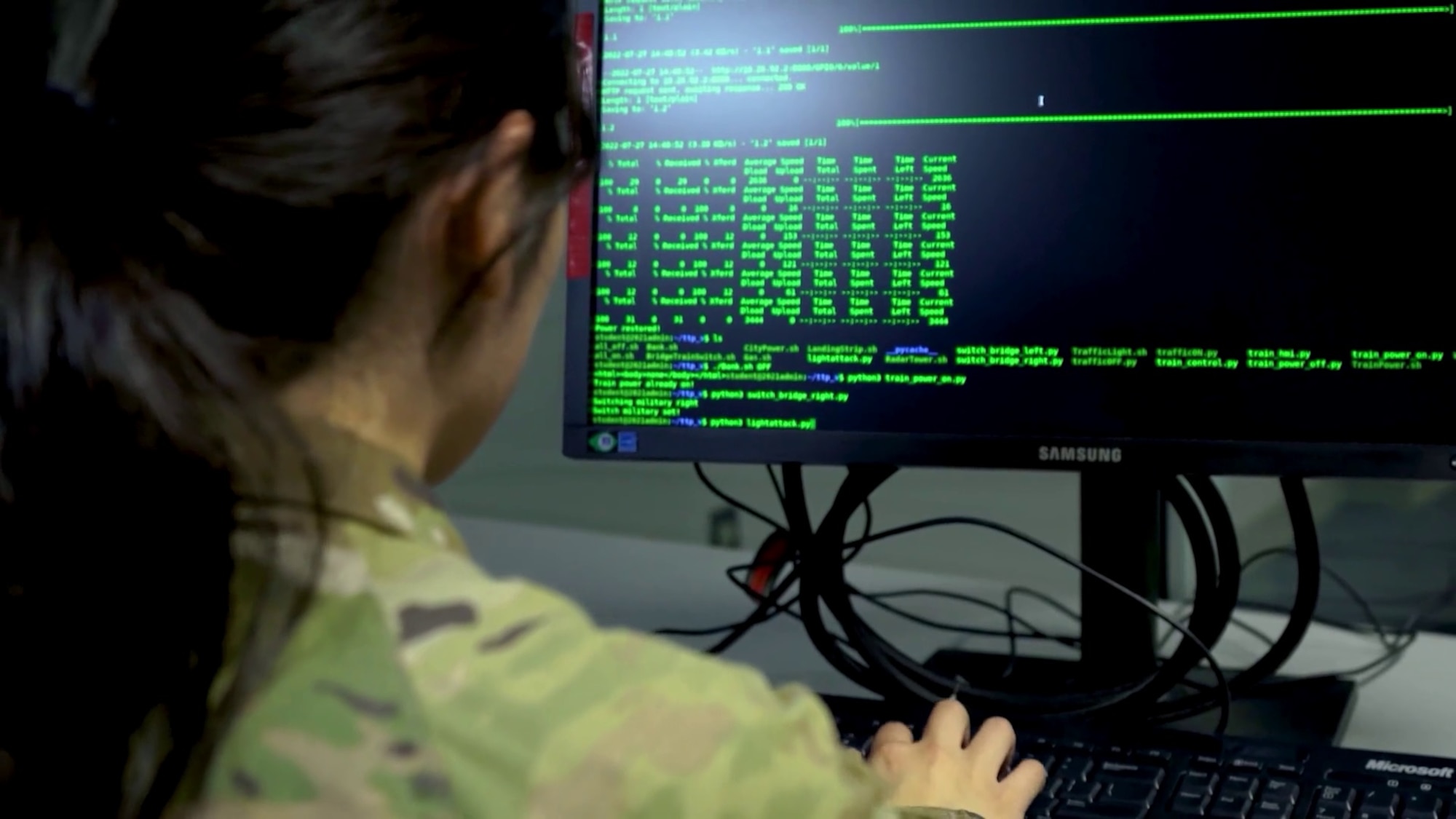 monitor screen of someone coding