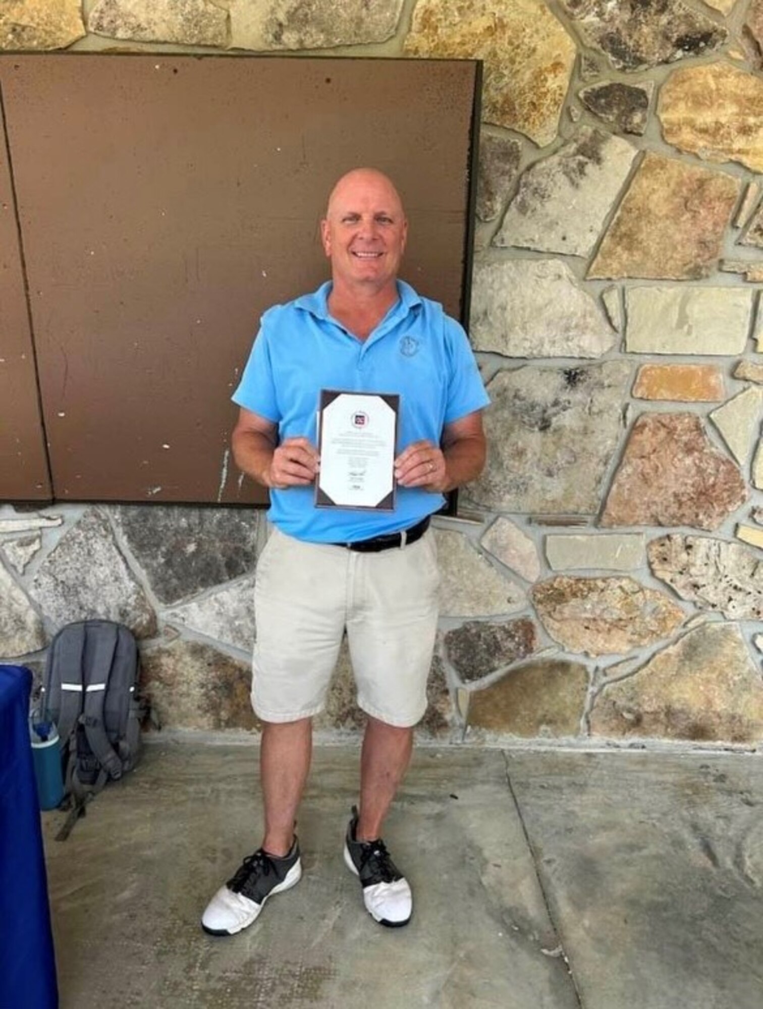 Arnold Engineering Development Complex employee Jay Potter learns he has qualified for the 44th U.S. Senior Open Championship in Newport, R.I., after shooting a 4-under 68 in a qualifying event in Oak Ridge, Tenn., June 3, 2024. Potter will compete in the championship at the Newport Country Club, Newport, Rhode Island, June 27-30, 2024. (Photo Provided)
