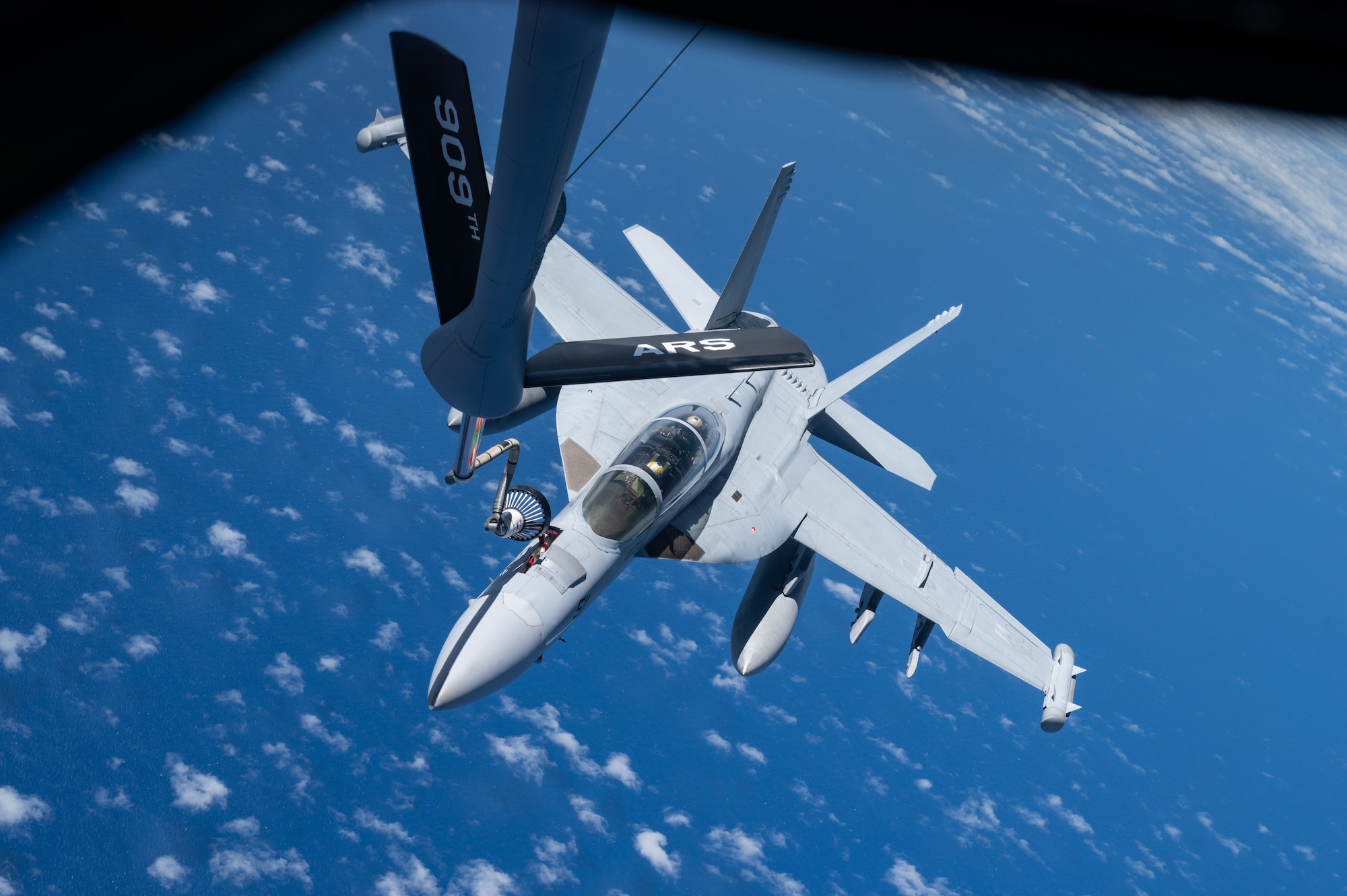 An EA-18 conducts aerial refueling.