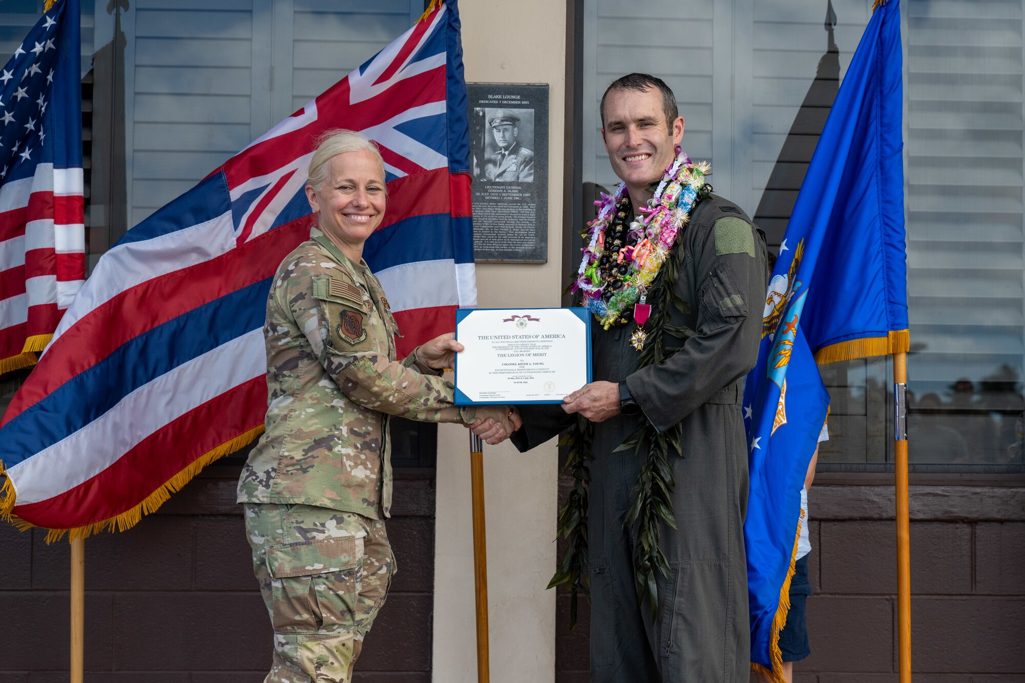 Airmen hold a certificate.