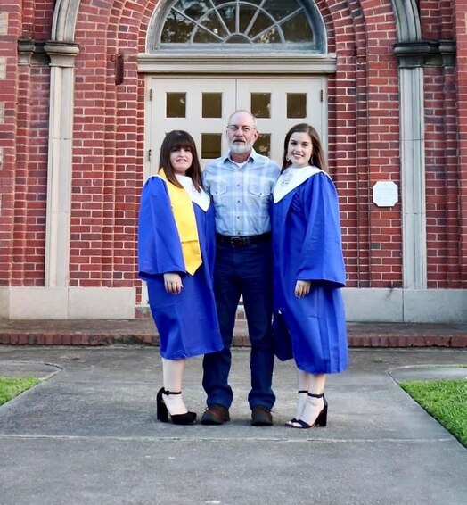  From left, Hannah Guillory, Brianna Guillory's twin sister, father Jim Guillory and U.S. Space Force Spc. 4 Brianna Guillory, 4th Space Operations Squadron wideband engineer, pose for a photo with family during a high school graduation in 2019. Brianna Guillory would later enlist into the U.S. Space Force in 2020. (Courtesy photo)