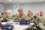 Image of Airmen attending a meeting.