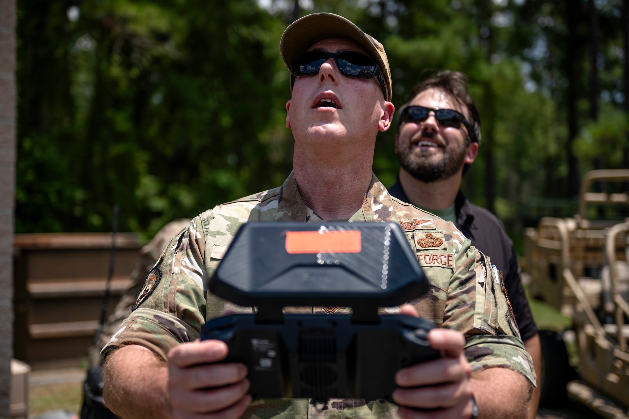 Person holding a drone controller