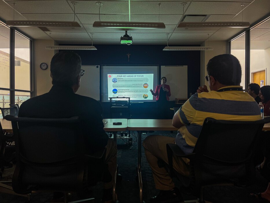 Two people looking at a presentation on the U.S. Army Corps of Engineers, Buffalo District