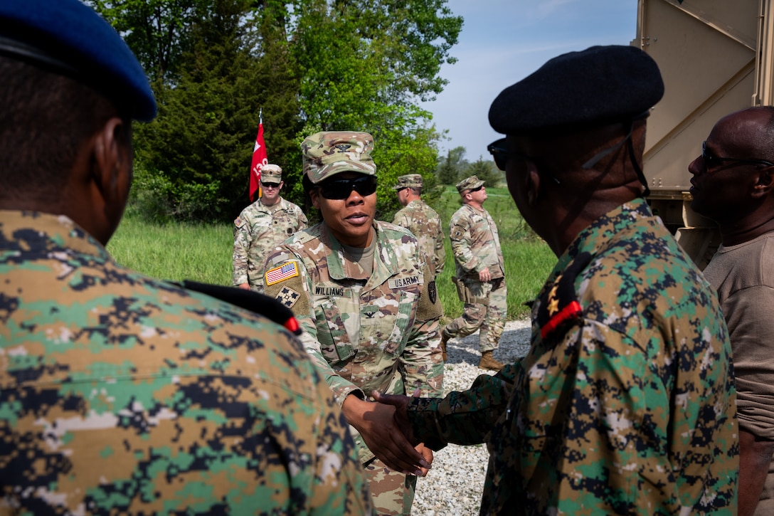 U.S. Army Col. Brandye, the commander of the 149th Maneuver Enhancement Brigade, shakes hands and greets engineer officers of the Djibouti Armed Forces (DAF) at Camp Dodge, Iowa on May 15, 2024. The DAF visited the Kentucky Army National Guard's 206th Engineer Battalion's annual training to learn ideas on how to set up battalion level engineer operations. (U.S. Army National Guard photo by Sgt. 1st Class Andrew Dickson)