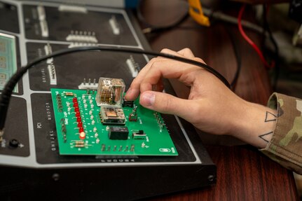 A U.S. Airman assigned to the 334th Training Squadron, works on equipment during a Radar, Airfield & Weather Systems Specialist lab practical application assignment on Keesler Air Force Base, Mississippi, June 20, 2024.