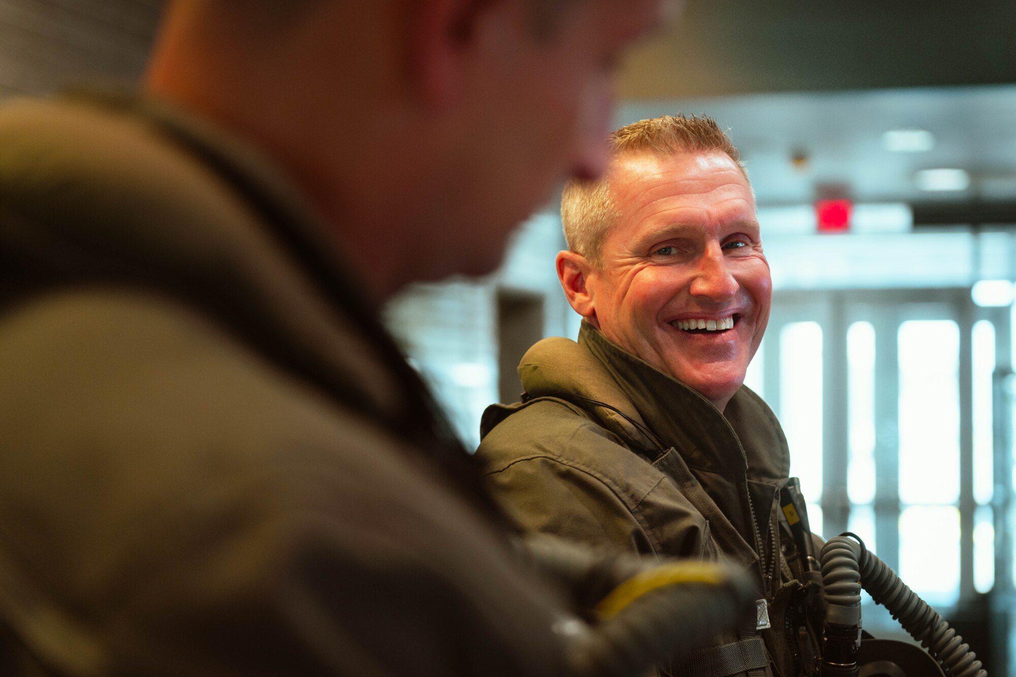 U.S. Air Force Brig. Gen. Jason Rueschhoff (right), 56th Fighter Wing commander, smiles to Col. Matthew Johnston (left), 56th Operations Group commander, before Rueschhoff’s finial flight.