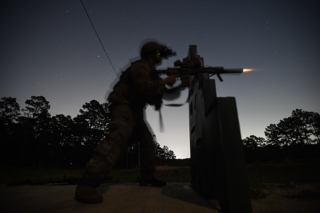 U.S. Army Sgt. Greg Richmond, with C Company, 1st Squadron, 150th Cavalry Regiment, West Virginia Army National Guard, engages targets with the XM7 rifle and XM157 scope during night fire testing of the rifle and scope at Fort Liberty, North Carolina, as part of the Next Generation Squad Weapon system, June 13, 2024. The system includes the XM7 rifle, the XM250 automatic rifle, and the XM157 fire control system, which are designed to replace the current M4 carbine, M249 Squad Automatic Weapon, and the M240 machine gun.