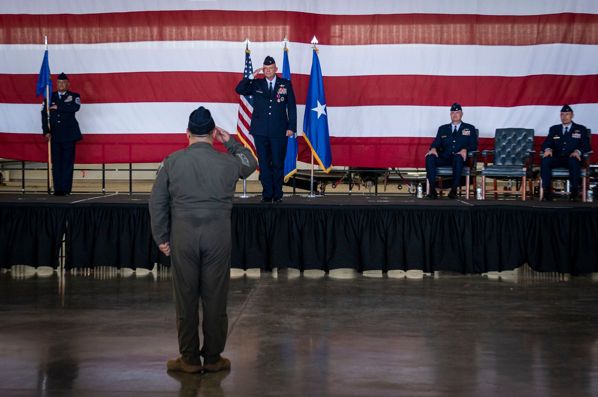 U.S. Air Force Col. Kevin Davidson (middle), former 47th Flying Training Wing (FTW) commander, gives a final salute as commander to his unit during the 47th FTW change of command ceremony at Laughlin Air Force Base, Texas, June 26, 2024. As commander, Davidson oversaw nearly 2,800 military and civilian personnel engaged in executing more than 61,000 aircraft sororities yearly in support of Laughlin’s Undergraduate Pilot Training mission. (U.S. Air Force photo by Senior Airman Kailee Reynolds)