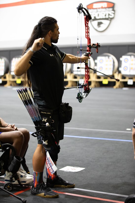 U.S. Army veteran Justin Mathers competes in archery