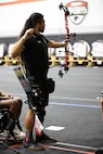 U.S. Army veteran Justin Mathers competes in archery