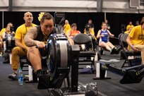 U.S. Army Spc. Melesete Togia competes in indoor rowing