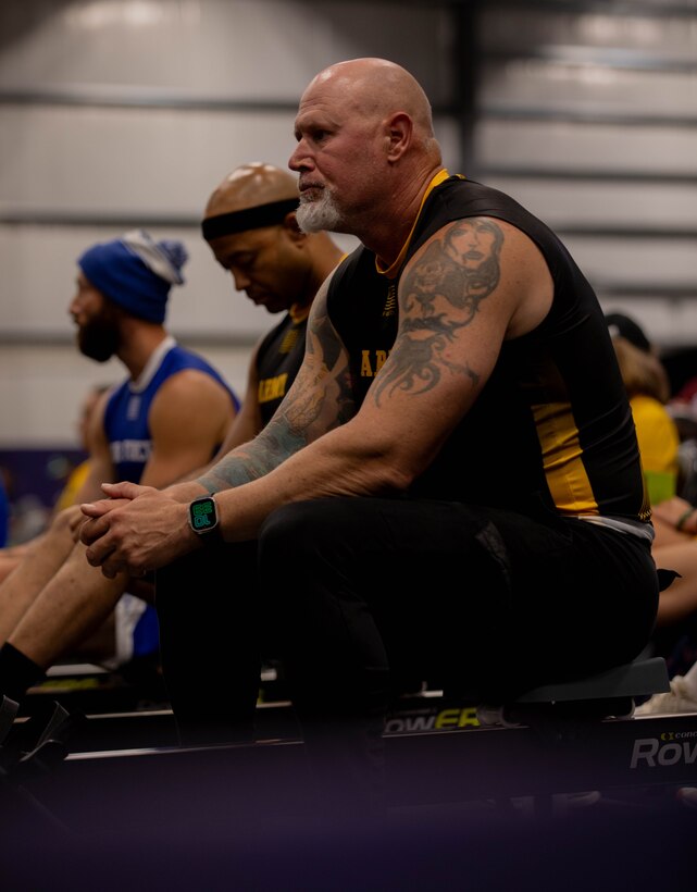 U.S. Army veteran Steve Bortle takes a moment before competing in the indoor rowing event