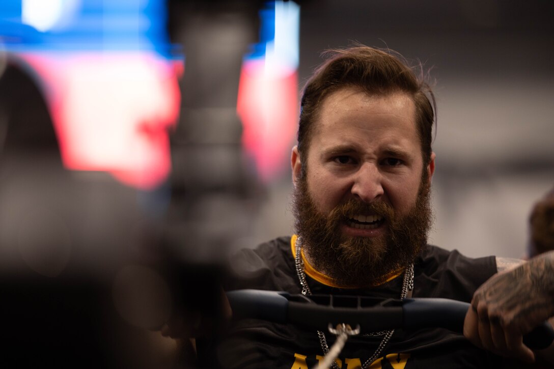 U.S. Army veteran Patrick Dayton competes in the indoor rowing event