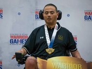 U.S. Army Cpt. Luis Avila wins a gold medal at the precision air event