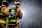 Firefighters spraying water