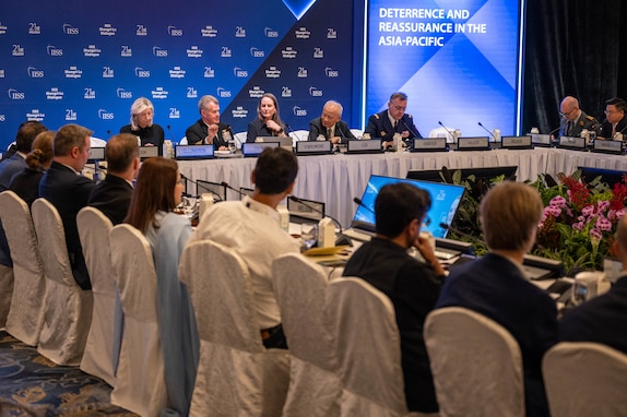 Adm. Samuel J. Paparo, second from left, commander of U.S. Indo-Pacific Command, speaks during a Shangri-La Dialogue panel, “Deterrence and Reassurance in the Asia-Pacific,” with senior leaders from France, the Netherlands and the People’s Republic of China, in Singapore, May 31, 2024. The Shangri-La Dialogue, hosted by the International Institute for Strategic Studies, is a defense summit focused on the Asia-Pacific region where ministers and representatives gather to discuss pressing security challenges and engage in bilateral talks. USINDOPACOM is committed to enhancing stability in the Asia-Pacific region by promoting security cooperation, encouraging peaceful development, responding to contingencies, deterring aggression and, when necessary, fighting to win. (U.S. Navy photo by Mass Communication Specialist 1st Class John Bellino)