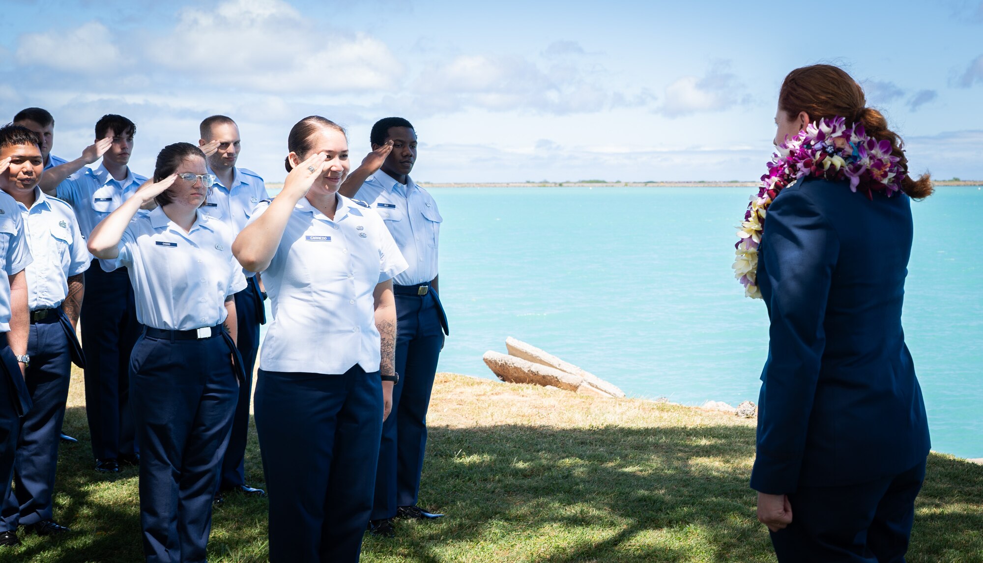 Airmen render salutes.