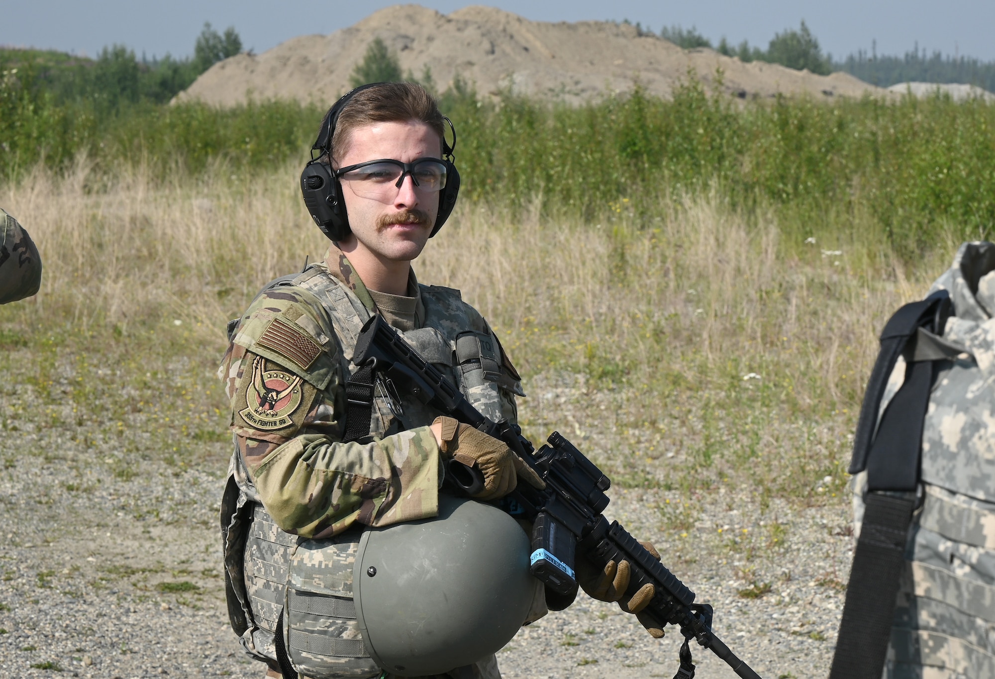 An Airman assigned to the 355th Aircraft Maintenance Unit poses for a photo during the Advanced Ready Training-Core (ART-C) Course June 26, 2024 at Eielson Air Force Base.