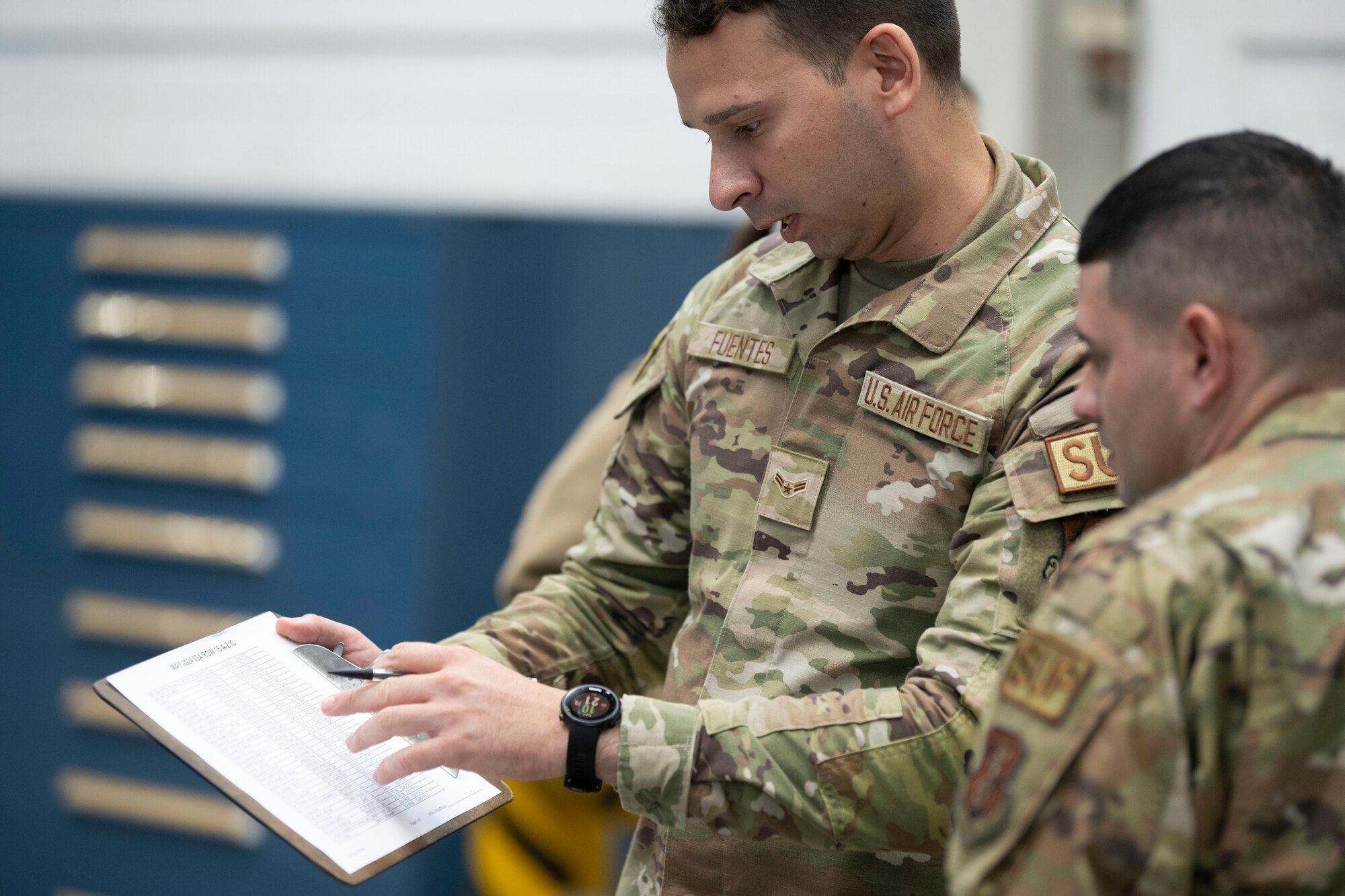 U.S. Air Force Airman 1st Class Adrian Fuentes, a material management journeyman assigned to the 156th Logistics Readiness Squadron, Puerto Rico Air National Guard, reviews inventory list at Spangdahlem Air Base, Germany, May 7, 2024. The 156th LRS integrated with the 52nd Logistics Readiness Squadron as a force multiplier, assisting with daily operations, augmenting capabilities in support of the 52nd Fighter Wing Saber Knight Readiness Exercise 24-01 and exchanging best practices during training. (U.S. Air National Guard photo by Master Sgt. Rafael D. Rosa)