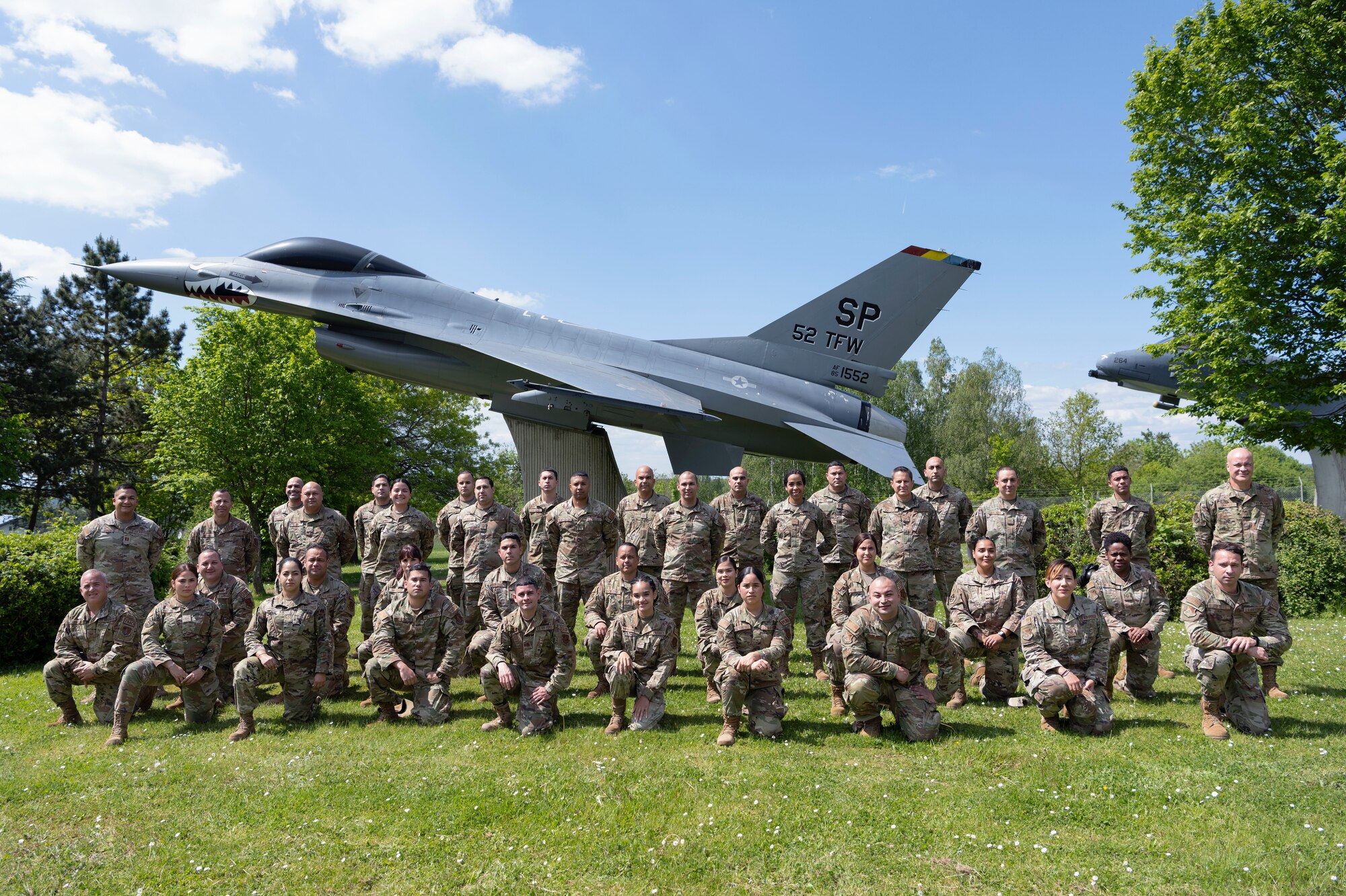 U.S. Airmen with the 156th Wing, Puerto Rico Air National Guard, pose for a group photo at Spangdahlem Air Base, Germany, May 9, 2024. The 156th LRS integrated with the 52nd LRS as a force multiplier, assisting with daily operations, augmenting capabilities in support of the 52nd Fighter Wing Saber Knight Readiness Exercise 24-01 and exchanging best practices during training. (U.S. Air National Guard photo by Master Sgt. Rafael D. Rosa)