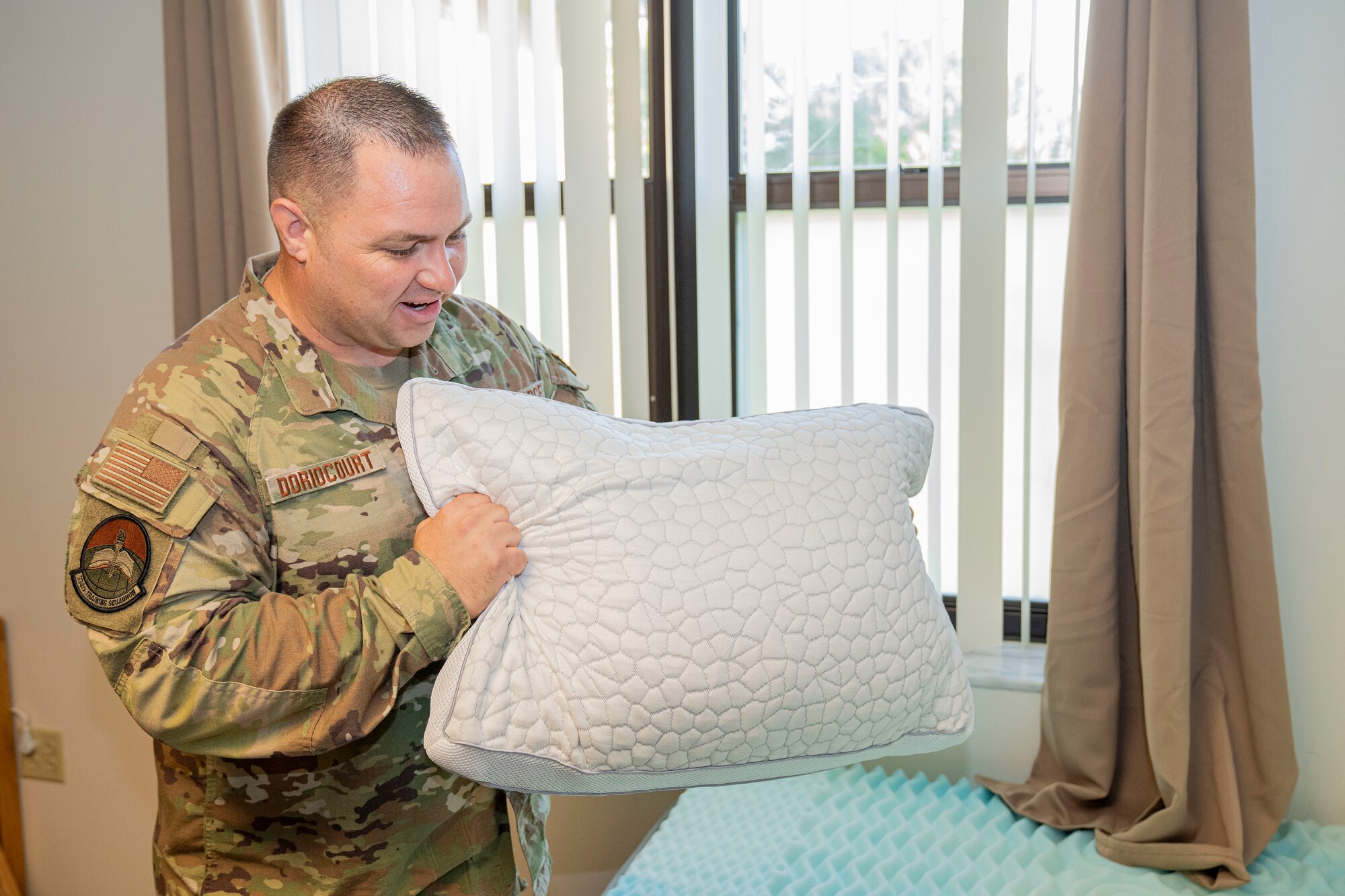 U.S. Air Force Tech. Sgt. Clinton Doriocourt, 334th Training Squadron Radar, Airfield & Weather Systems Specialist instructor, talks about the different items certain participants received for the 334th TRS sleep study on Keesler Air Force Base, June 20, 2024.