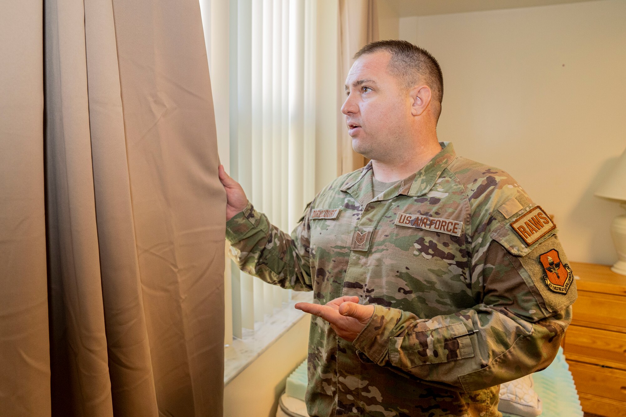 U.S. Air Force Tech. Sgt. Clinton Doriocourt, 334th Training Squadron Radar, Airfield & Weather Systems Specialist instructor, talks about the different items certain participants received for the 334th TRS sleep study on Keesler Air Force Base, June 20, 2024.