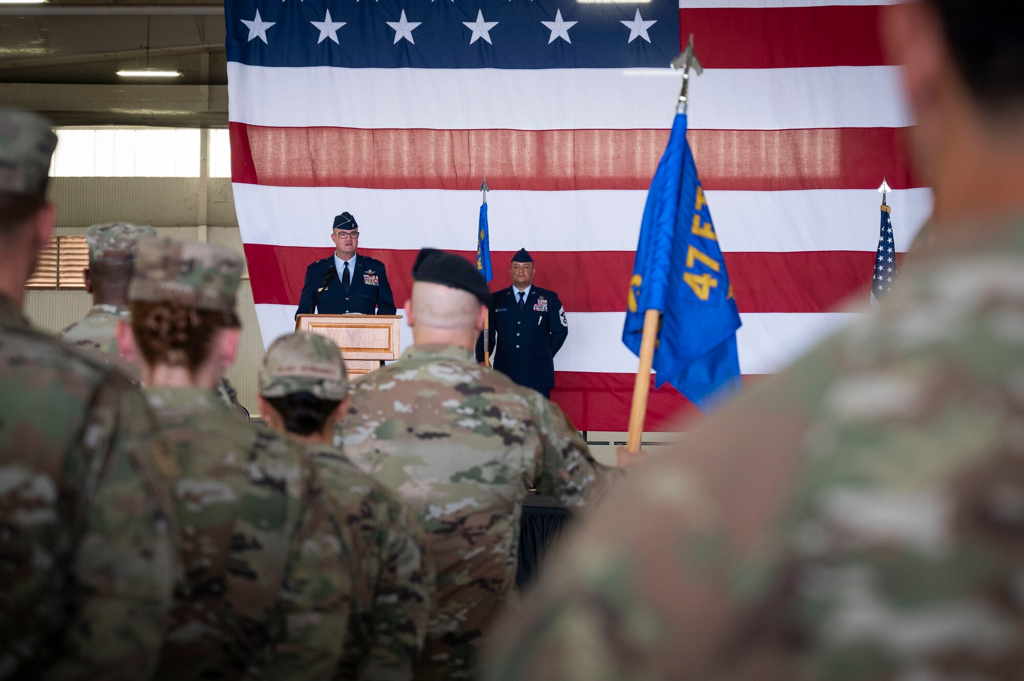 U.S. Air Force Brig. Gen. Randall Cason, Mobilization Assistant to the Commander, Nineteenth Air Force, delivers a speech during the 47th Flying Training Wing change of command ceremony at Laughlin Air Force Base, Texas, June 26, 2024. Change of command ceremonies represent a formal transfer of authority and responsibility for a unit from one commanding officer to another. (U.S. Air Force photo by Senior Airman Kailee Reynolds)
