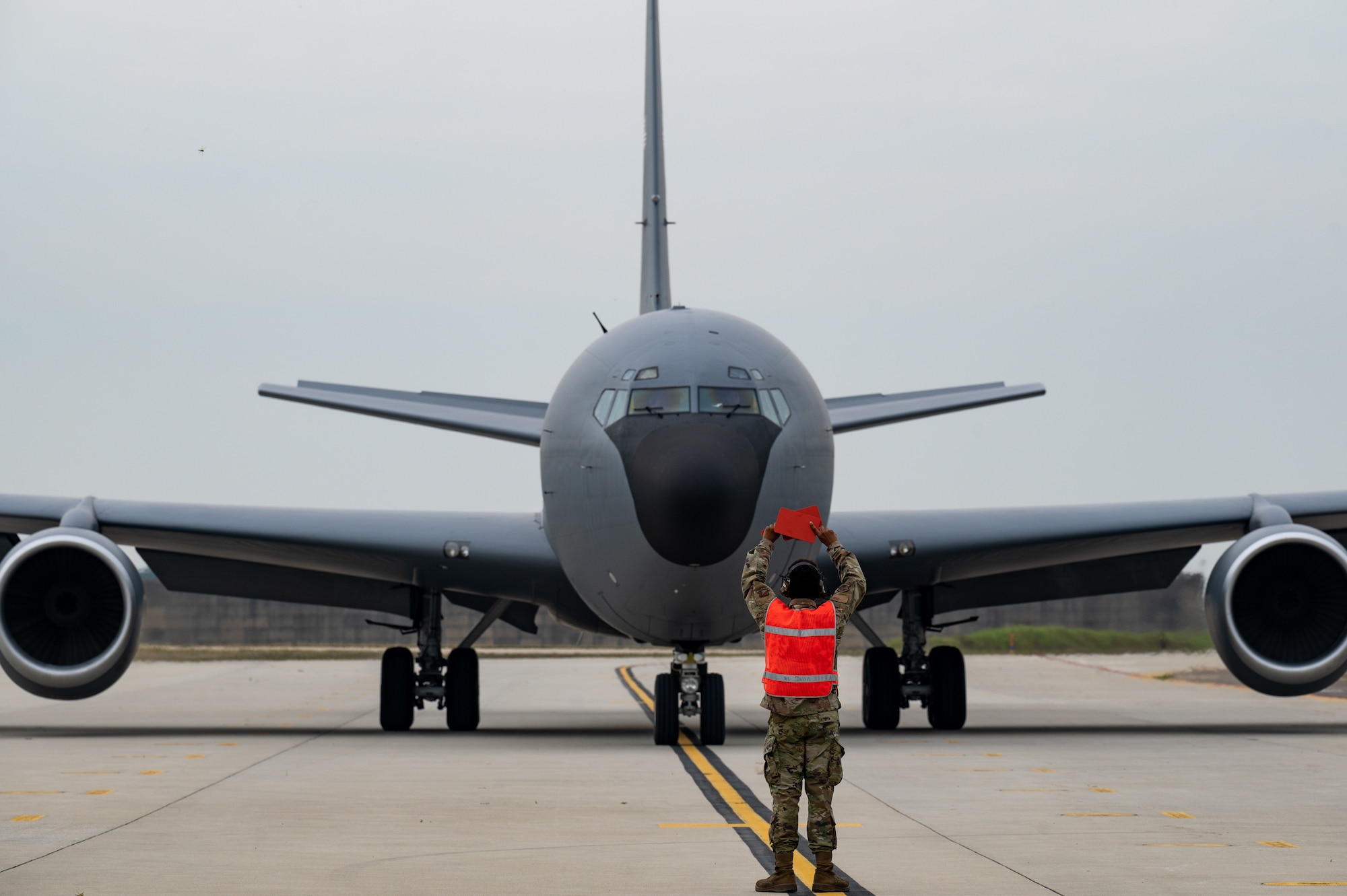 person standing by KC-135