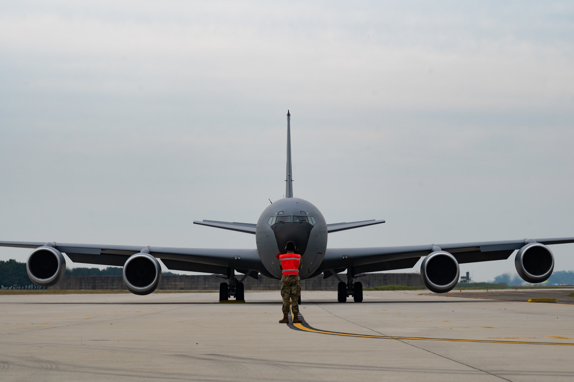 person standing by KC-135