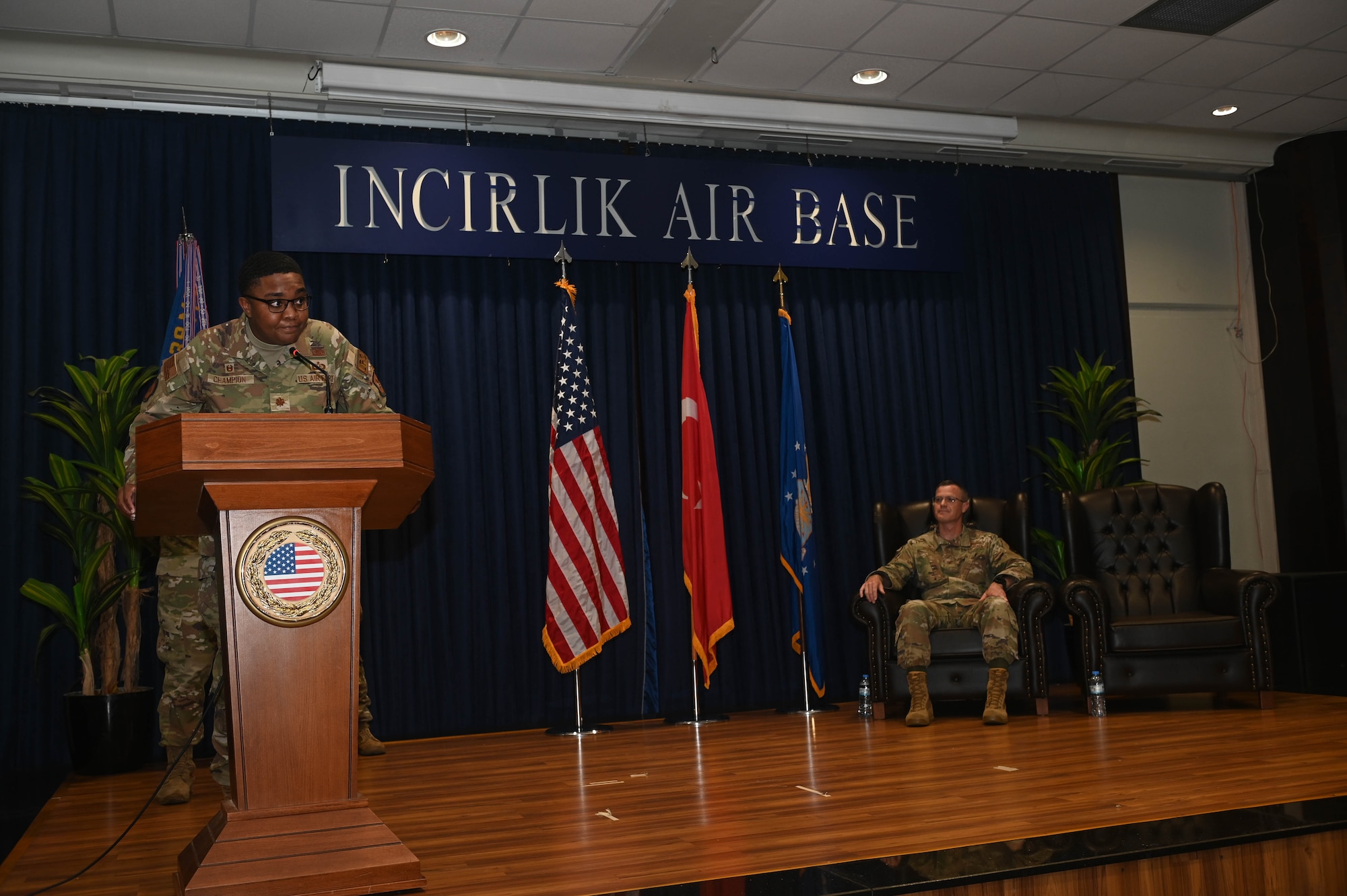 U.S. Air Force Maj. Damiqua Champion gives her first speech as the 39th Logistics Readiness Squadron commander during an assumption of command ceremony at Incirlik Air Base, Türkiye, June 27, 2024. The change of command and assumption of command ceremonies are long-standing military traditions that represents the formal transfer of responsibility from one officer to another. (U.S. Air Force photo by Staff Sgt. Alexandria Lee)