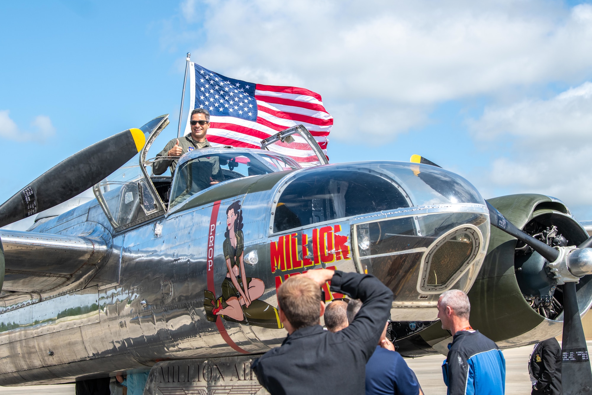 A Pathfinder smiles during a tour of a Douglas A-26C Invader