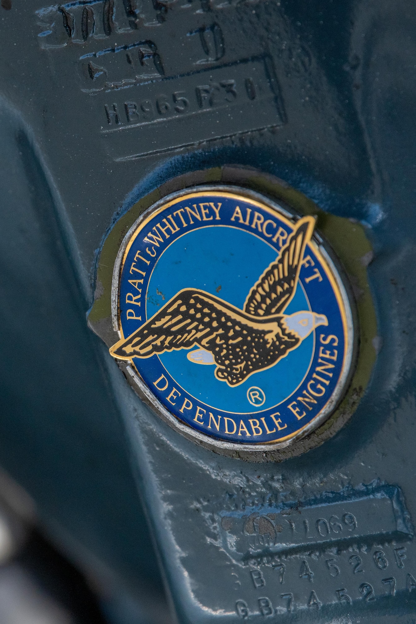 An emblem reading “PRATT & WHITNEY AIRCRAFT - DEPENDABLE ENGINES” is displayed on the engine of a Douglas A-26C Invader