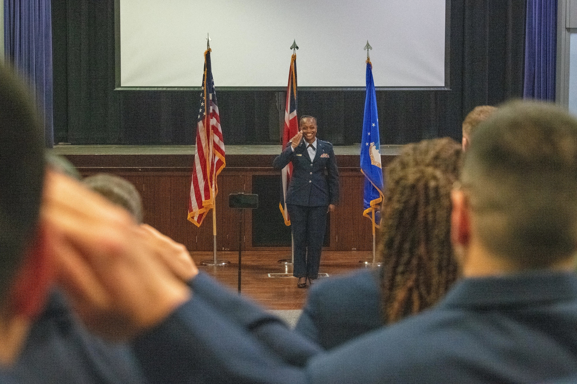 Airman receives a first salute during the 422nd MDS change of command ceremony