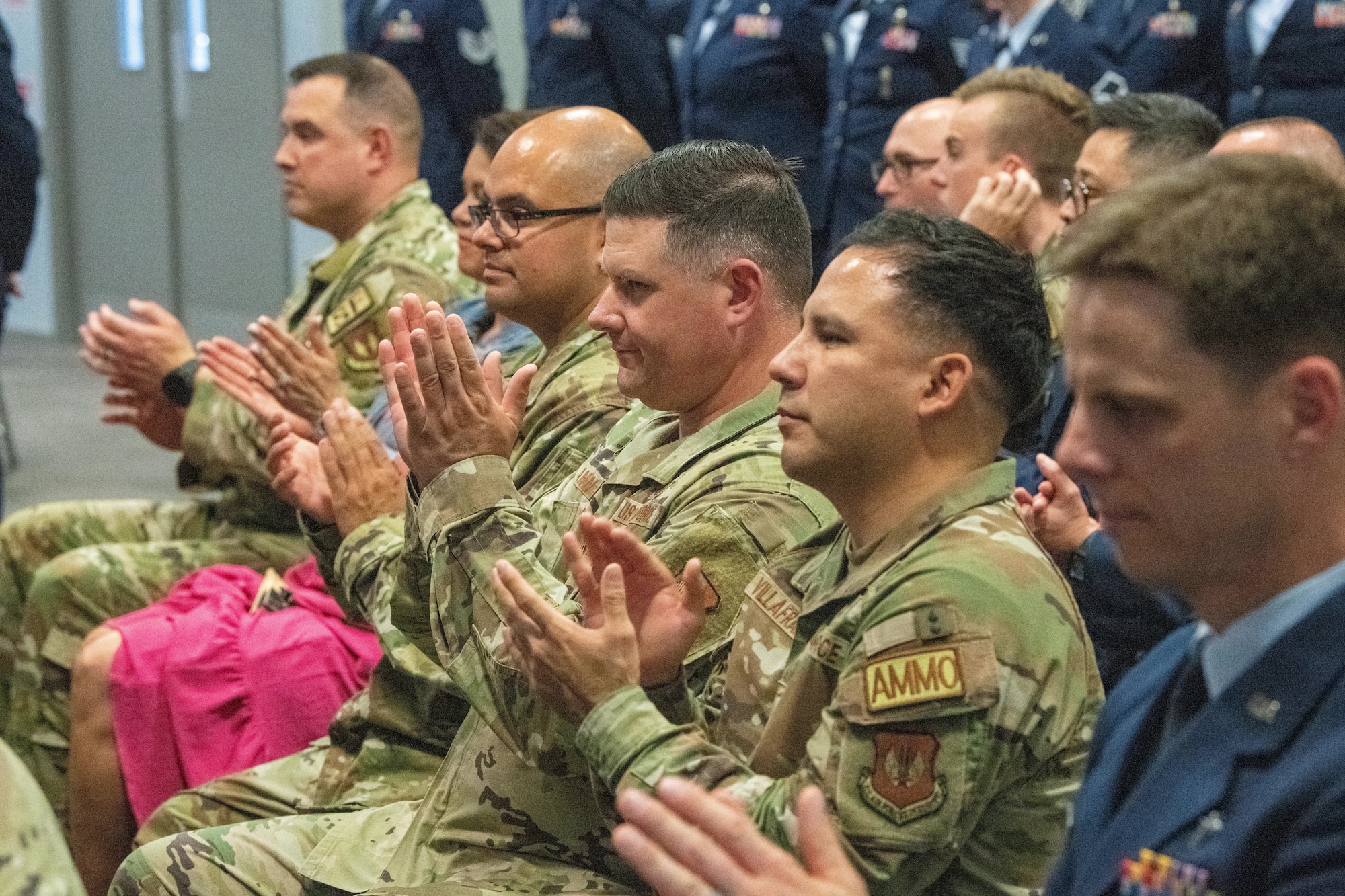 Attendees applaud during the 422nd Medical Squadron change of command ceremony
