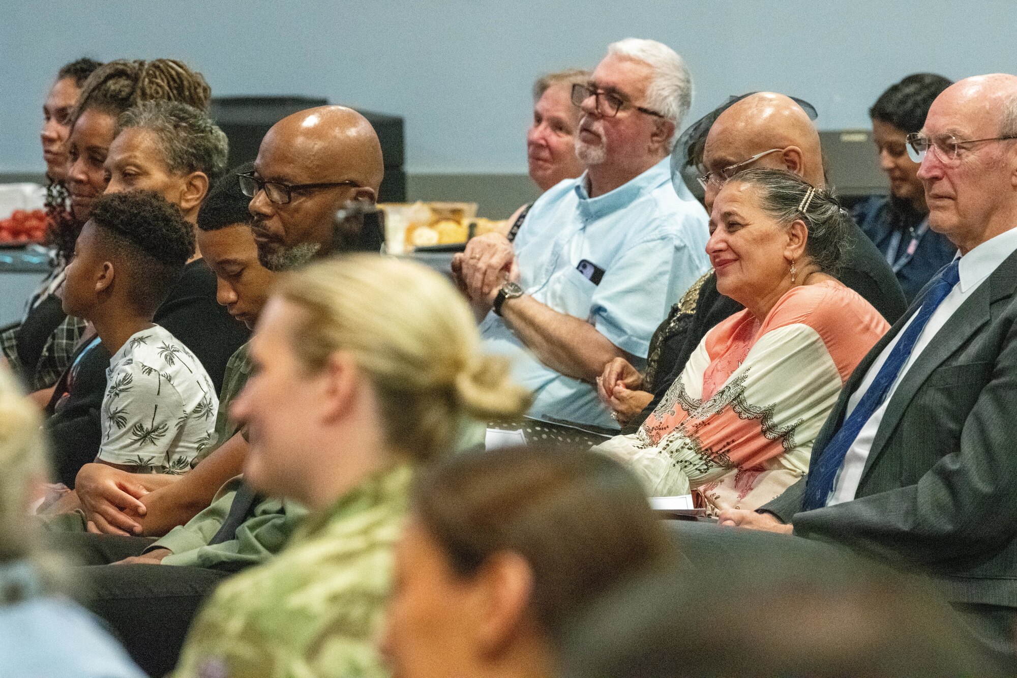Attendees smile during the 422nd Medical Squadron change of command ceremony