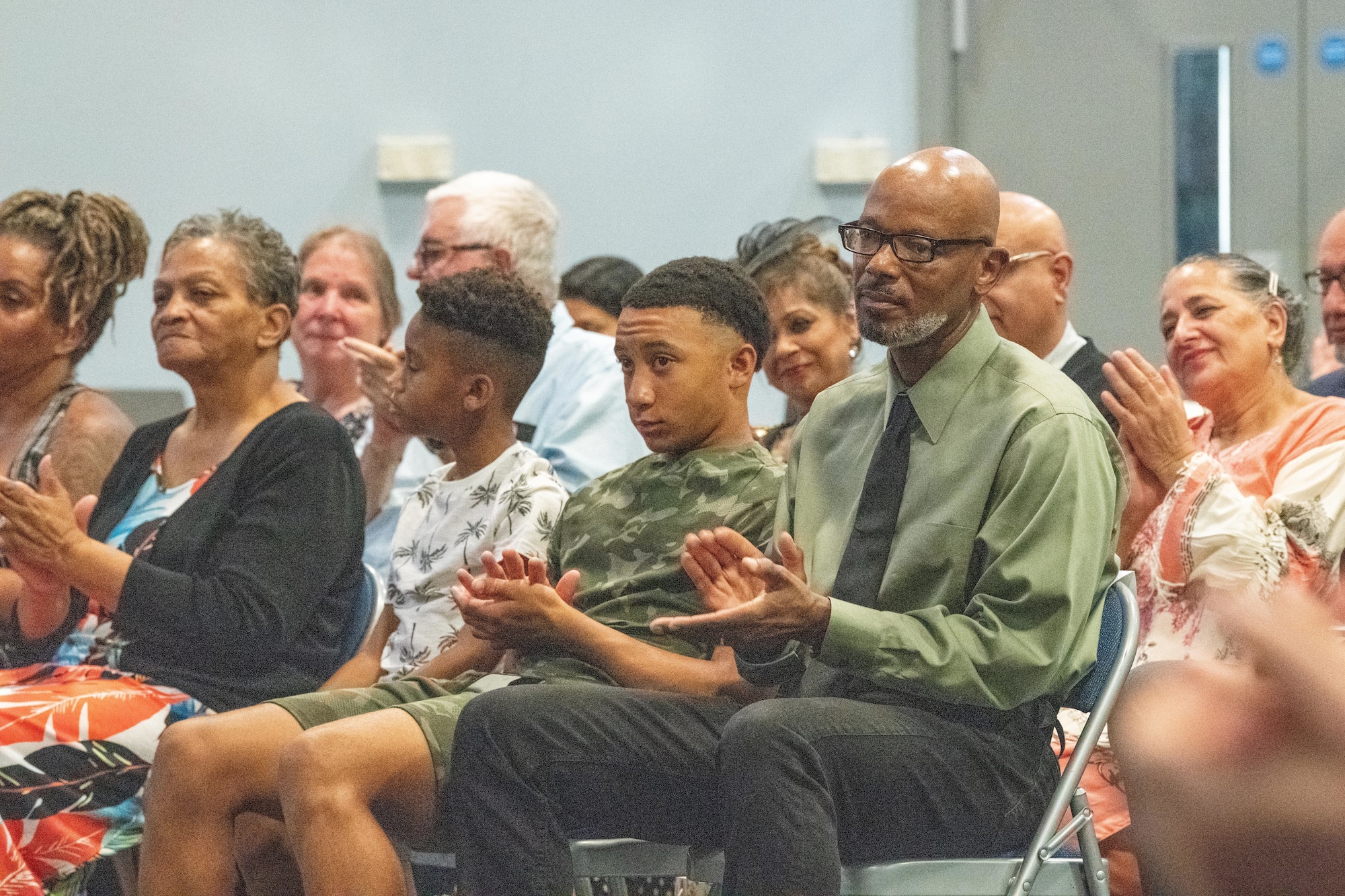 Attendees applaud during the 422nd Medical Squadron change of command ceremony