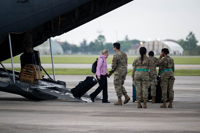 Civic leaders arrive at Aviano Air Base.