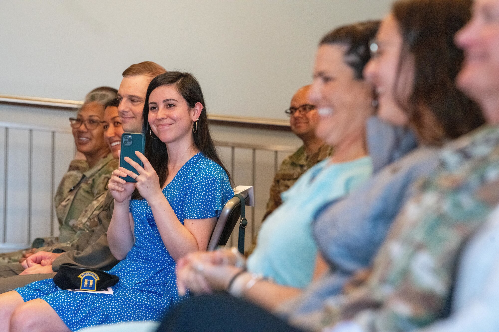 Attendees smile during the 422nd Security Forces Squadron assumption of command ceremony