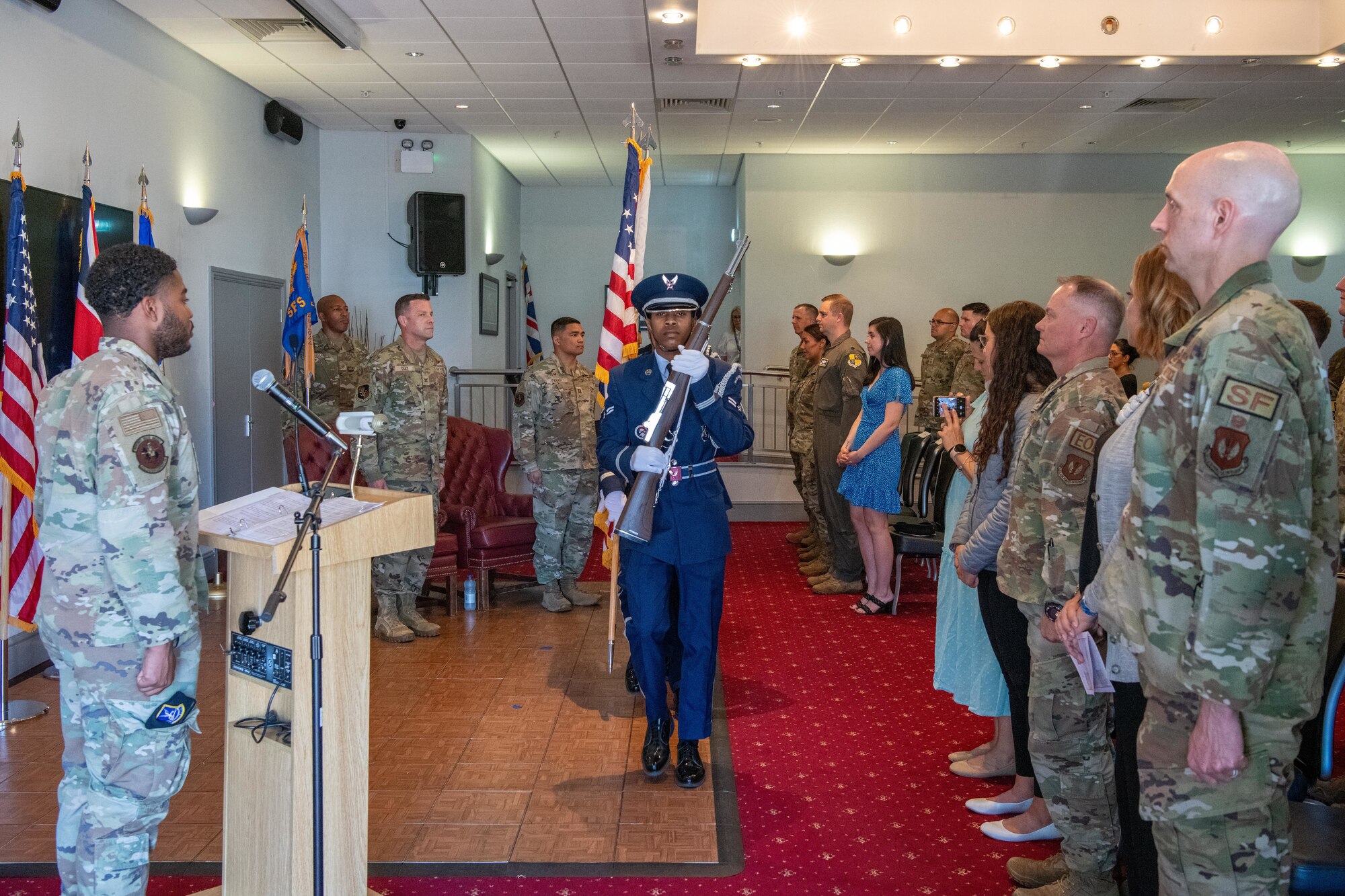 Honor Guardsmen present the colors during the 422nd Security Forces Squadron assumption of command ceremony