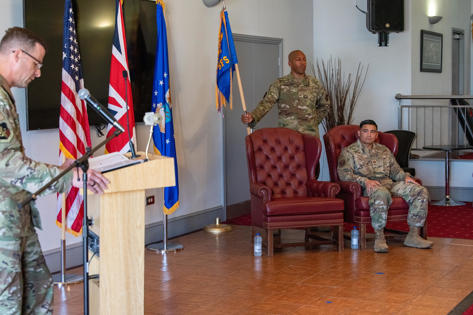 Airman listens to remarks during the 422nd SFS assumption of command ceremony