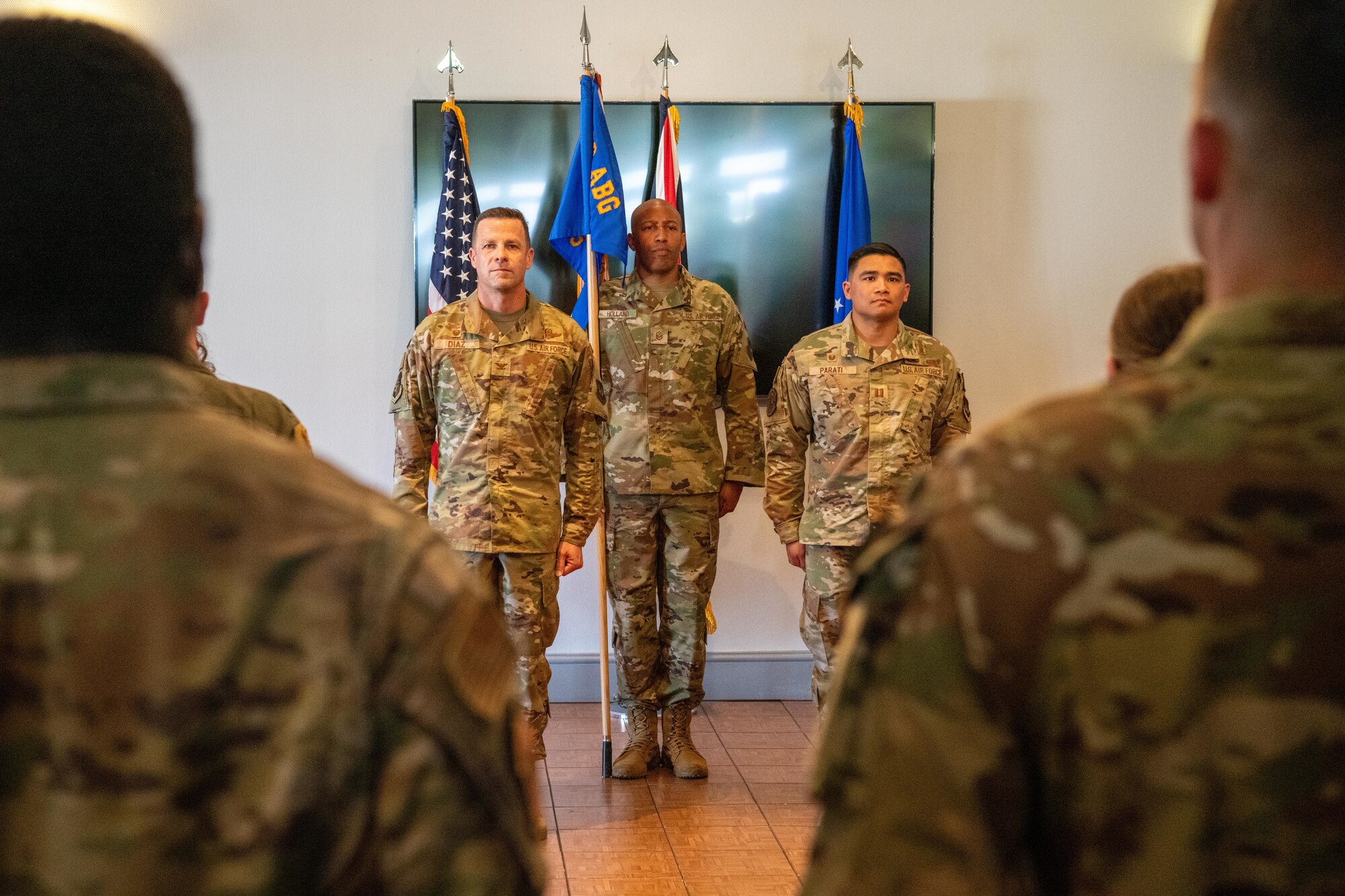 Airmen stand at attention