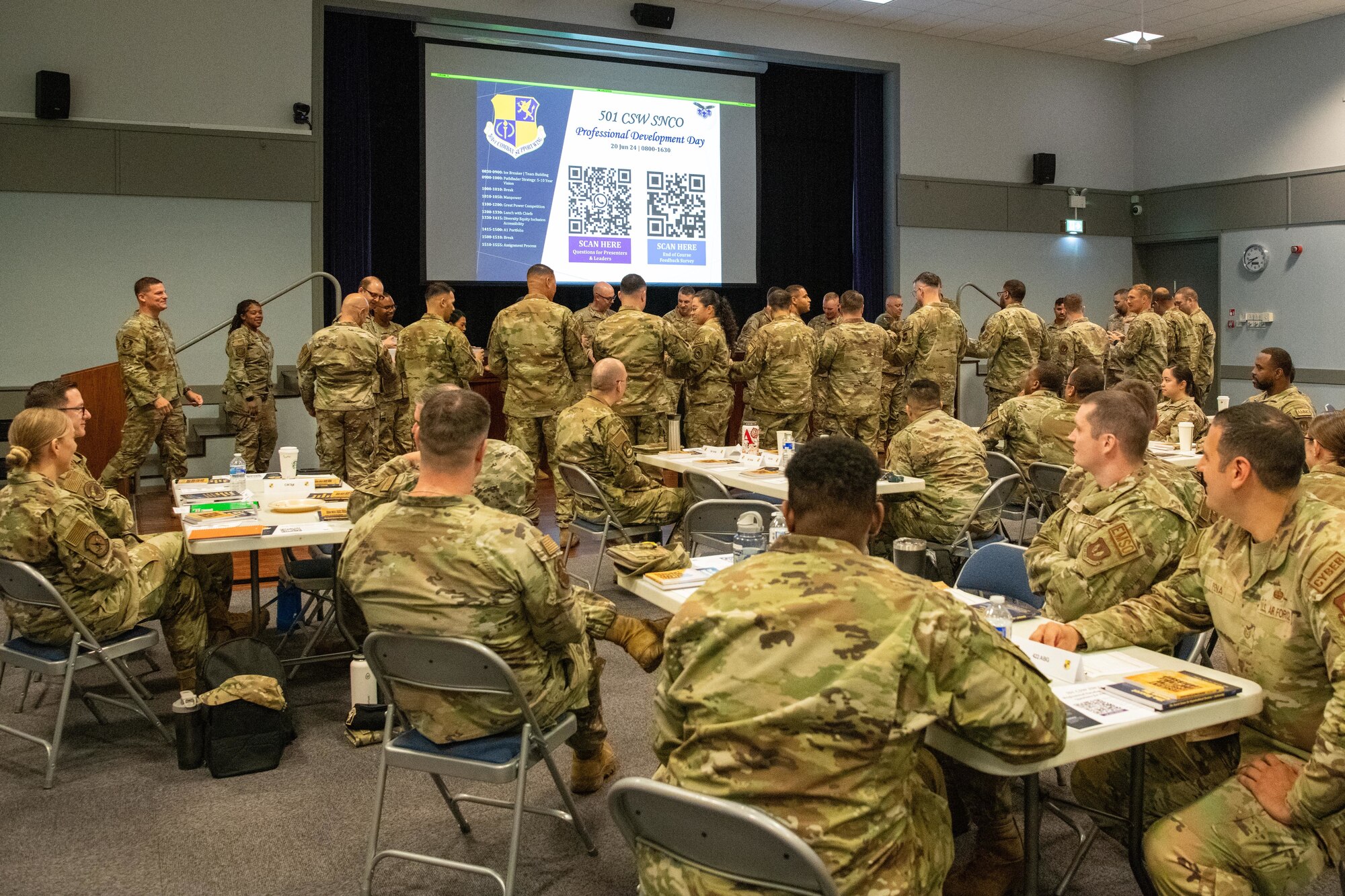 Airmen participate in an ice-breaker activity during a senior leadership professional development seminar