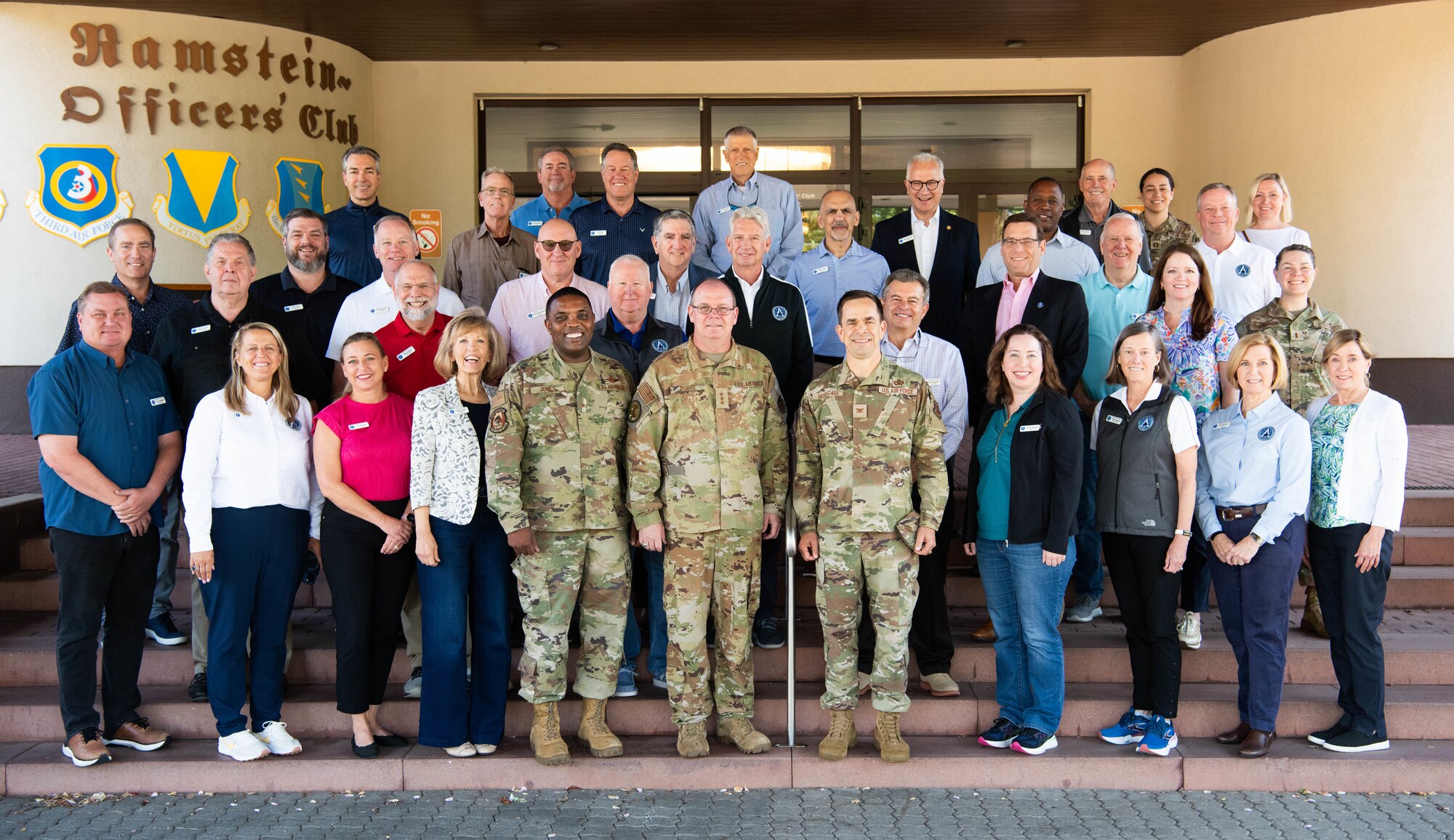 Members of the Air and Space Forces civic leader group, U.S. Air Force Airmen and senior leadership pose for a photo during an immersion at Ramstein Air Base, Germany, June 24, 2024. The civic leader group engaged in a multi-day tour across U.S. Air Forces in Europe – Air Forces Africa bases to receive valuable familiarization and education on USAFE-AFAFRICA missions, future initiatives, and command priorities. (U.S. Air Force photo by Senior Airman Jared Lovett)