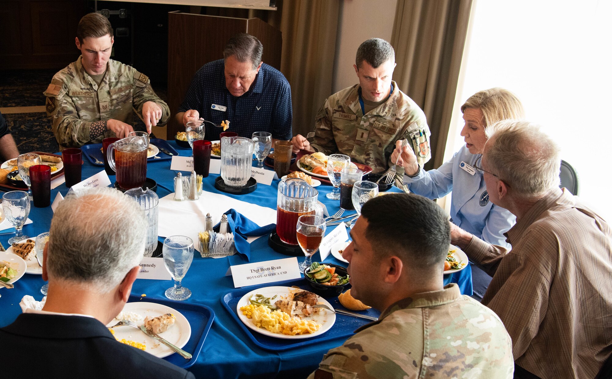 U.S. Air Force Airmen eat lunch with members of the Air and Space Forces civic leader group during an immersion at Ramstein Air Base, Germany, June 24, 2024. The civic leader group hosted the lunch in order to hear about experiences of Airmen. The civic leader group engaged in a multi-day tour across U.S. Air Forces in Europe – Air Forces Africa bases to receive valuable familiarization and education on USAFE-AFAFRICA missions, future initiatives, and command priorities. (U.S. Air Force photo by Senior Airman Jared Lovett)