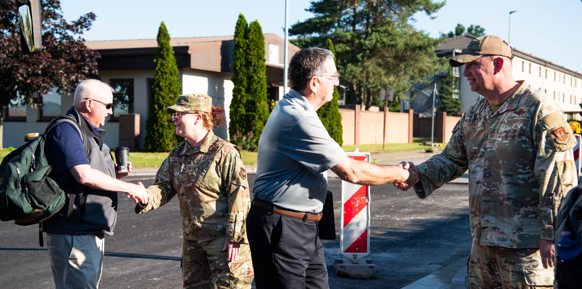U.S. Air Force Brig. Gen. Adrienne L. Williams, 86th Airlift Wing commander and Chief Master Sgt. Louis Ludwig, 86th AW command chief, welcome members of the Air and Space Forces civic leader group during an immersion at Ramstein Air Base, Germany, June 25, 2024. Civic leaders provide ideas and feedback to advise the Secretary of the Air Force, Air Force Chief of Staff, Chief of Space Operations and other senior leaders about how missions can best be accomplished in their respective areas and about public attitudes toward Air and Space Force’s activities. The civic leader group engaged in a multi-day tour across U.S. Air Forces in Europe – Air Forces Africa bases to receive valuable familiarization and education on USAFE-AFAFRICA missions, future initiatives, and command priorities. (U.S. Air Force photo by Senior Airman Jared Lovett)
